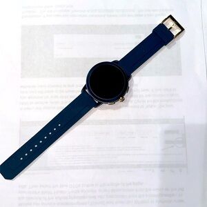 Used Tory Burch DW7T2 smart watch navy silicone band brass hardware